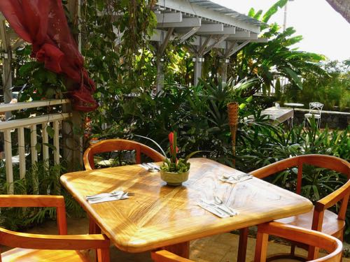 Outside dining area makes slow food dining in Hawaii a pleasant experience.