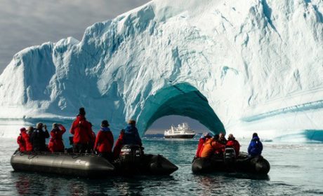 Iceberg hunting in Greenland on a luxury expedition cruise.