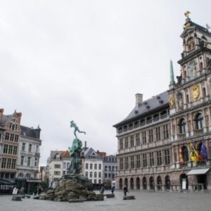 plaza with fountain and statue in the middle