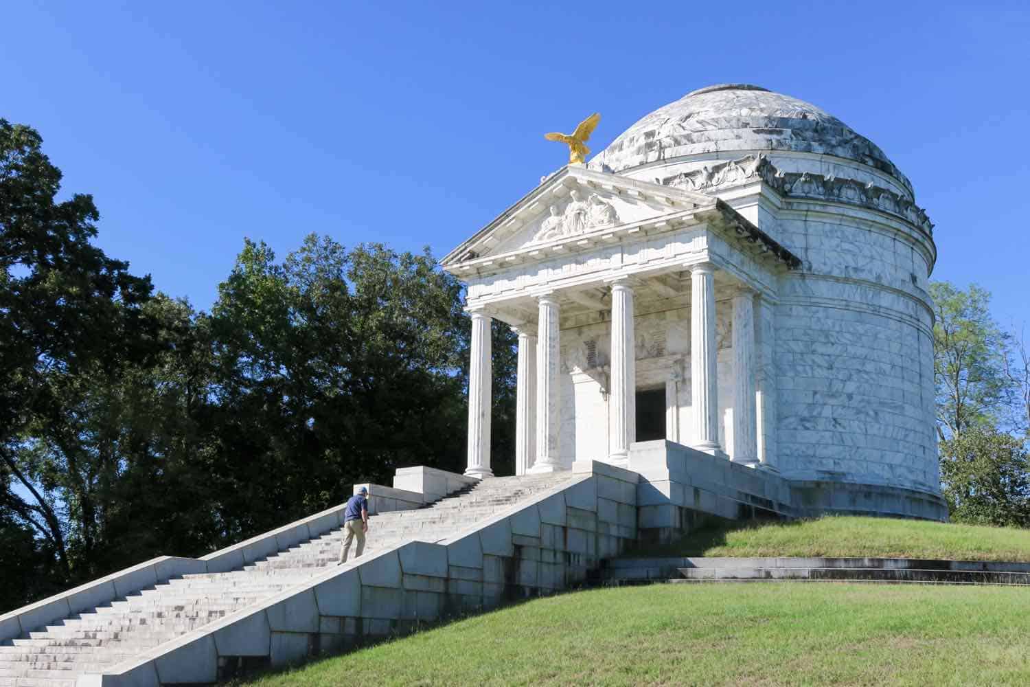 White stone monument with columns and round roof in Vicksburg National Military Park