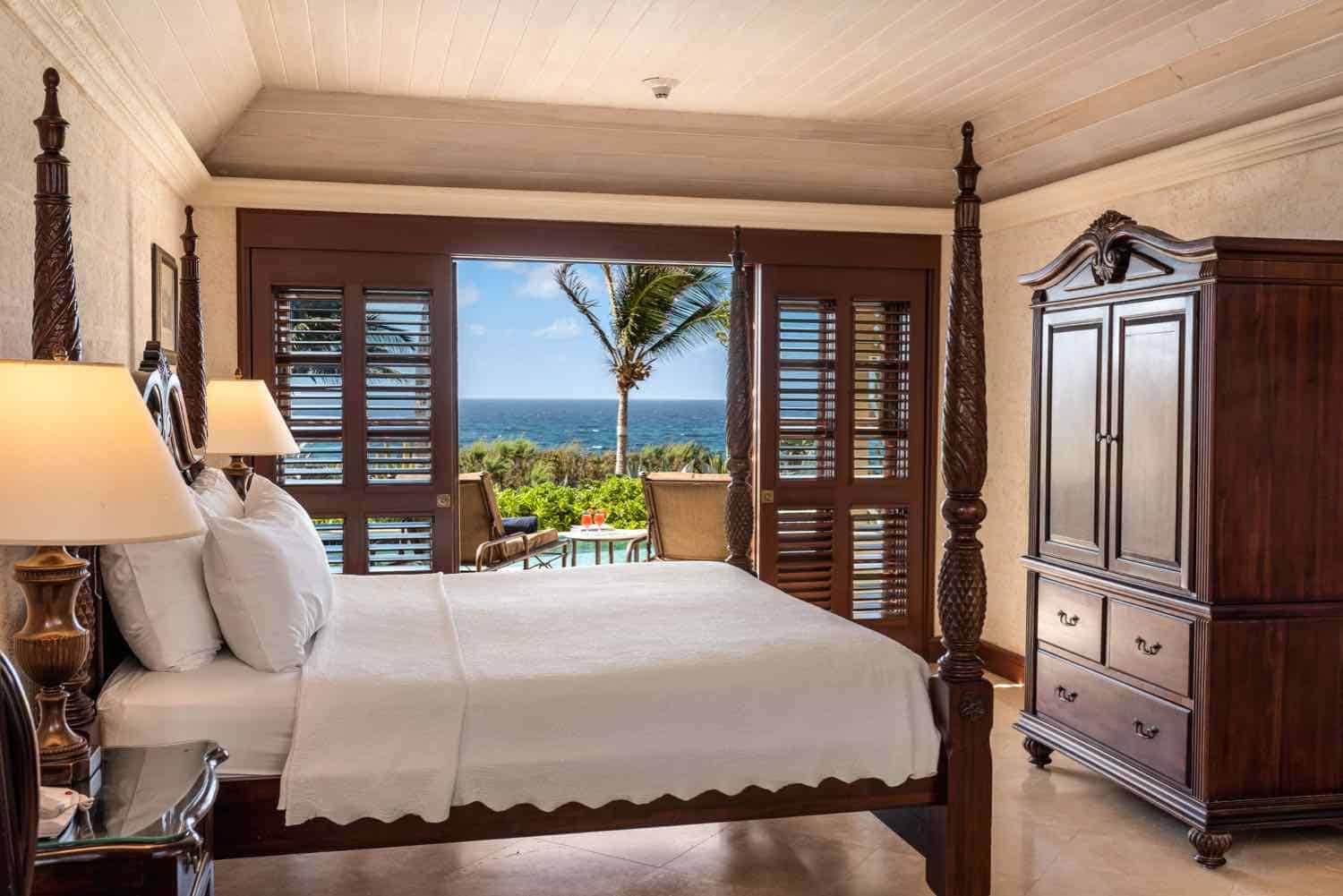 four poster bed with a sea view