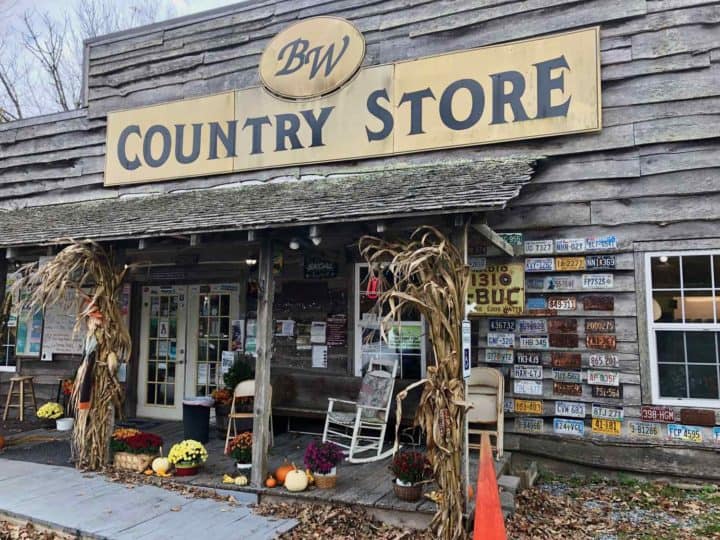 Old country store with rocking chairs on the front porch
