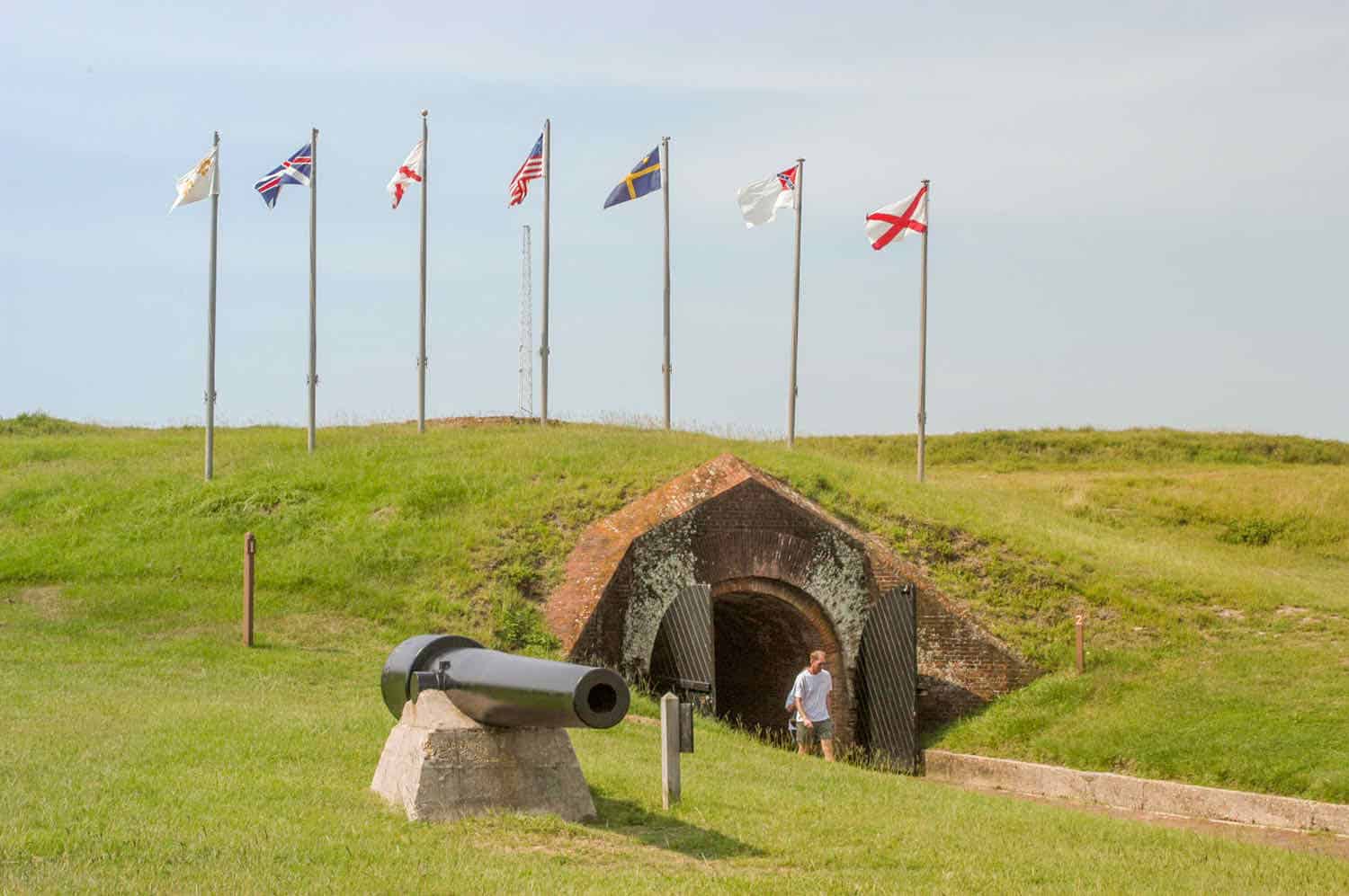 Brick entrance in a grassy hill leading inside Fort Morgan on the Alabama Gulf Coast