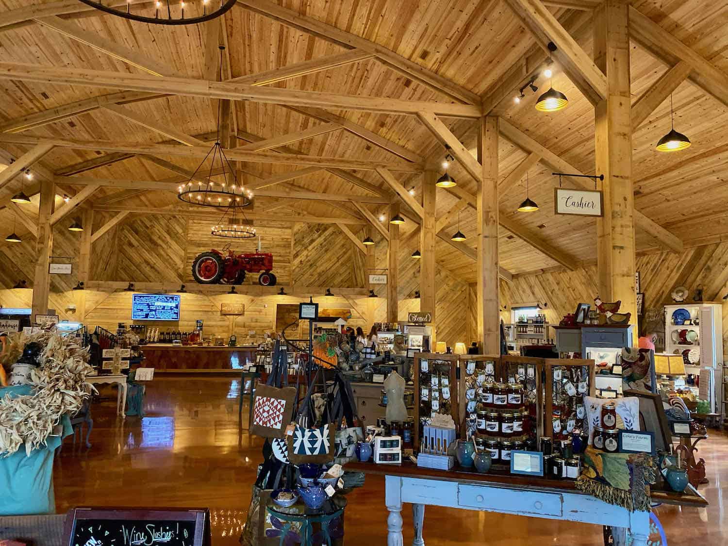 Big wooden barn with farm made items for sale at Mike's Farm in Onslow, North Carolina.
