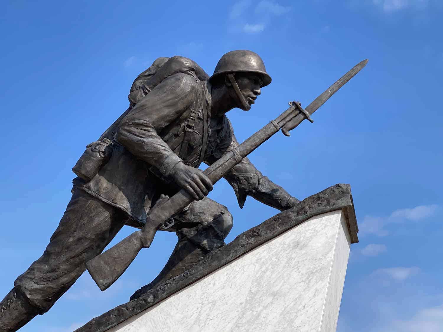 Bronze statue of first black marine at Montford Point Marine Memorial.