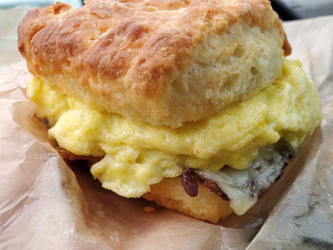 Biscuit stuffed with eggs, cheese, bacon and potatos