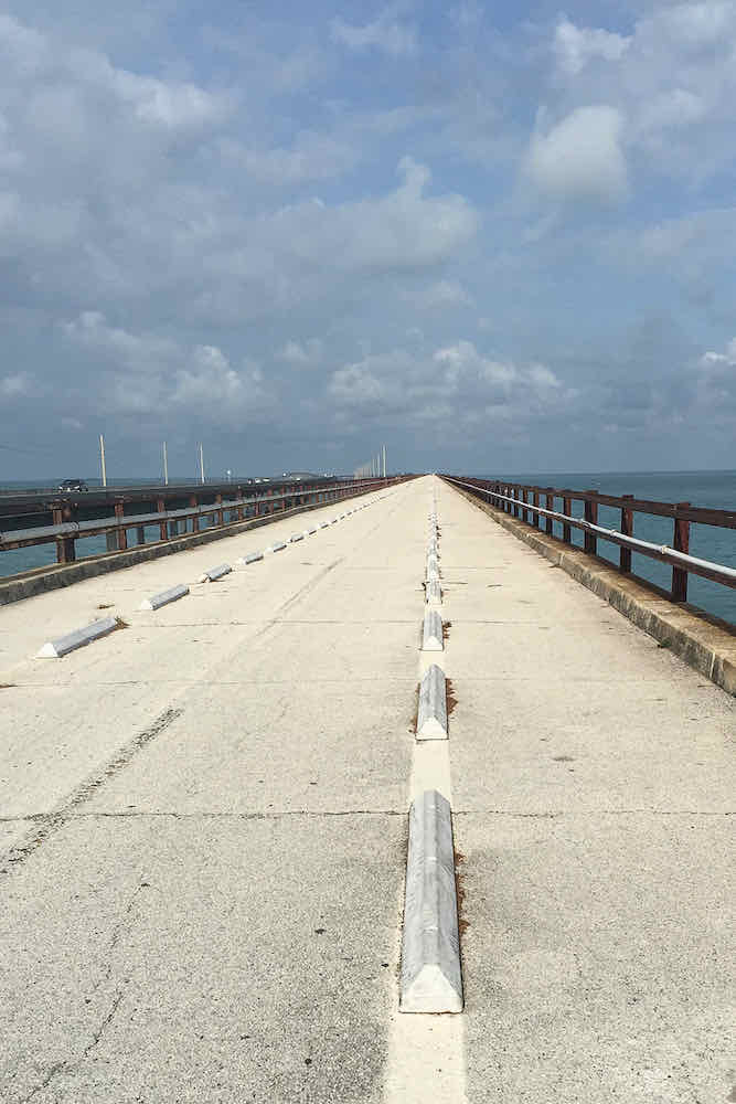 Pavement stretches out on seven mile bridge in Florida Keys