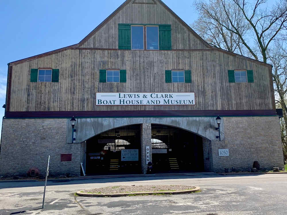 Wooden building with sign saying "Lewis & Clark Boat House and Museum" in St Charles, MO.