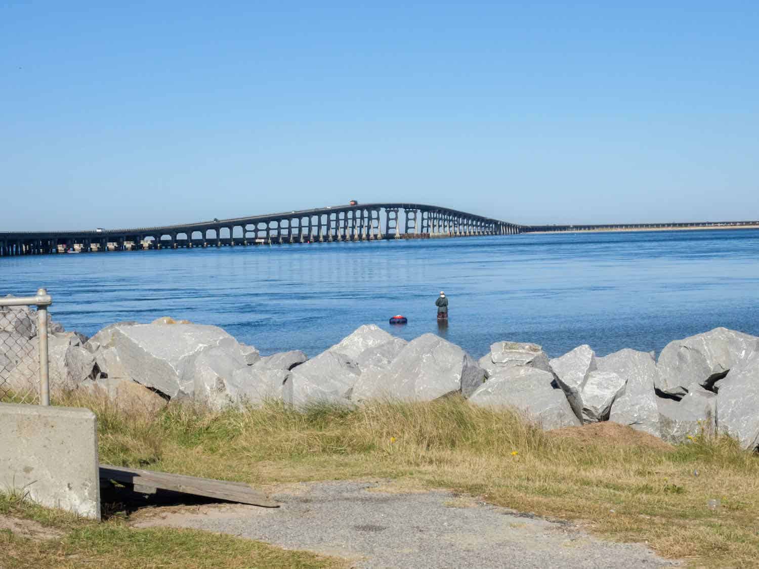 A long bridge arches over the water on the Outer Banks