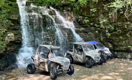 ATV's under Outlaw Waterfall in West Virginia