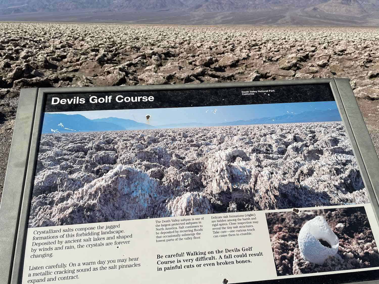 Signage explaining Devils Golf Course on a Death Valley 2 day trip.